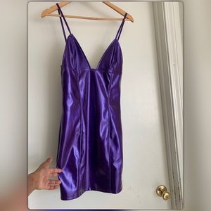 Purple faux leather mini dress.